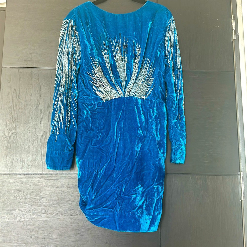 Party dress in a good condition, was wearing twice.
